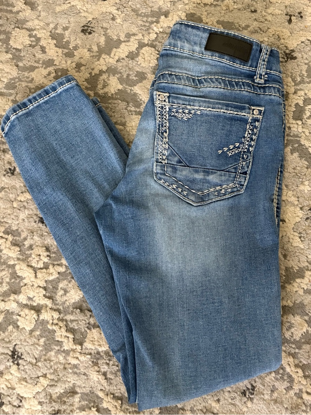 Buckle Light Blue Cropped Jeans with Embroidered Back Pocket